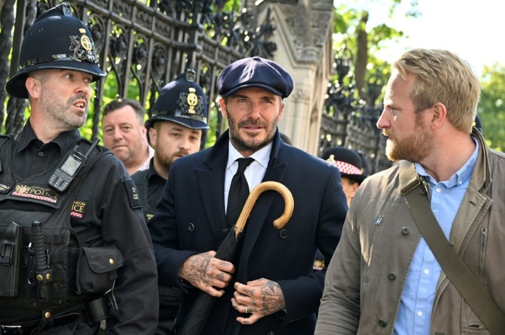 Beckham queues through the night to see queen’s coffin